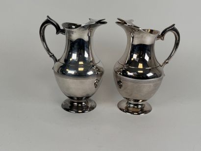 Pair of silver-plated punch jugs decorated...