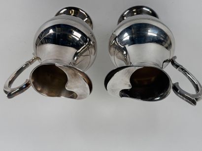 Pair of silver-plated punch jugs decorated...
