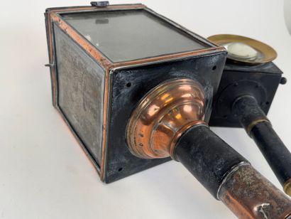 Two copper, brass and metal carriage lanterns.
48...