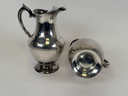 Pair of silver-plated punch jugs decorated...