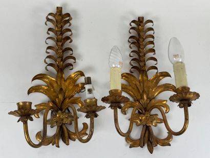 Pair of two-arm sconces in cut-out and gilded...