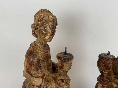 Pair of carved wood picnic tables decorated...