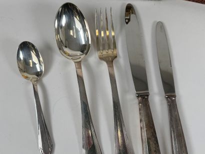 Set of silver-plated flatware with stylized...