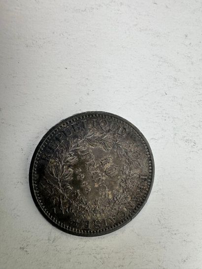 10 franc Hercules silver coin.