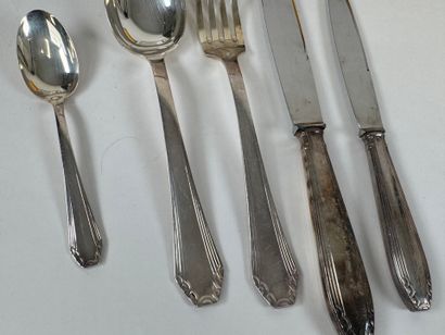 Set of silver-plated flatware with stylized...