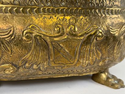 Large jardinière in repoussé brass decorated...