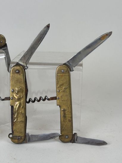 Set of 4 brass and metal pocket knives decorated...