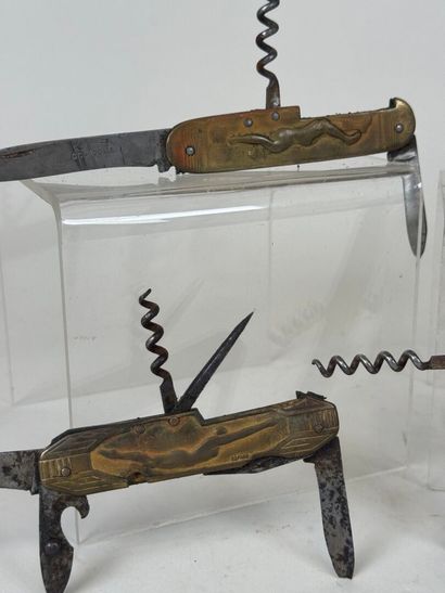 Set of 4 brass and metal pocket knives decorated...
