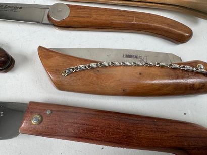 Collection of six folding knives in wood...