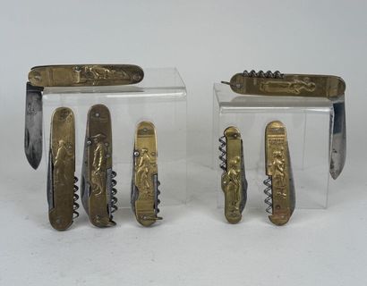 Set of 7 brass and steel pocket knives decorated...