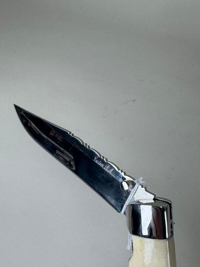 Large metal and bone knife, blade marked...