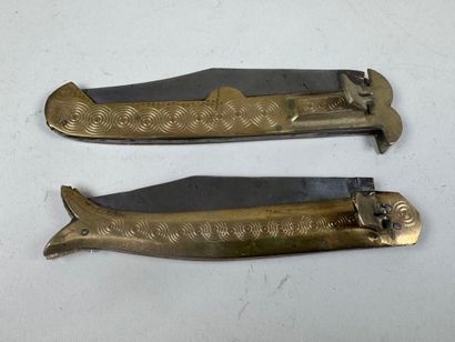 Two large chased brass and metal knives,...