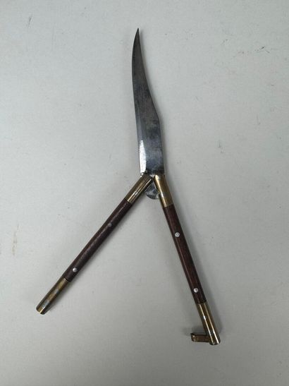 Set of three knives, one of which has an...