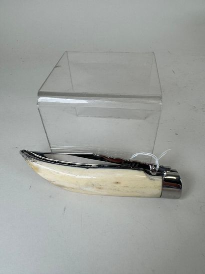 Large metal and bone knife, blade marked...