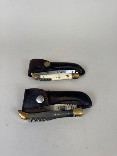 LAGUIOLE.
Two horn and ivory pocket knives.
L....