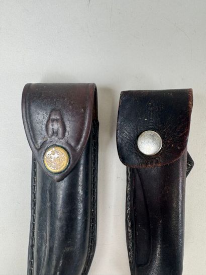 LAGUIOLE.
Two horn and ivory pocket knives.
L....
