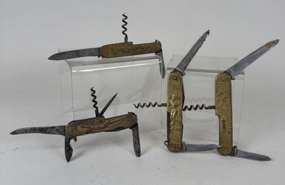 Set of 4 brass and metal pocket knives decorated...