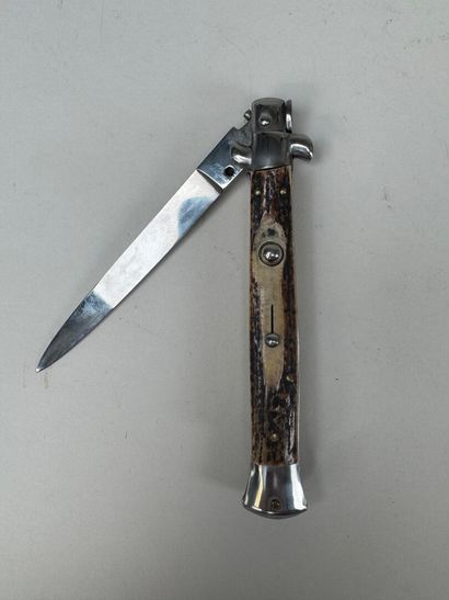 Set of three knives, one of which has an...