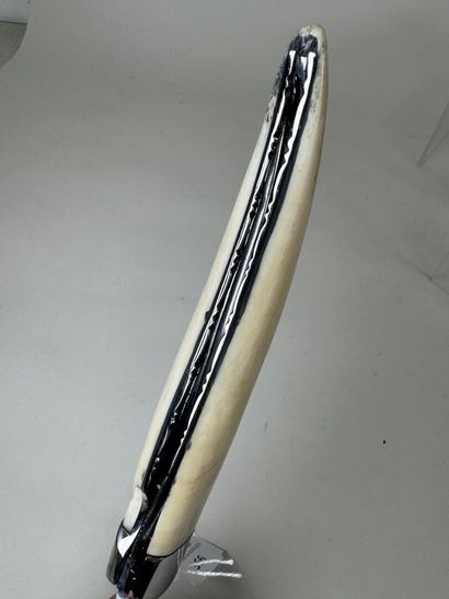 Large metal and bone knife, blade marked...