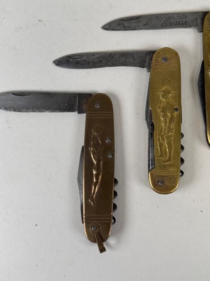 Set of 4 brass and steel pocket knives decorated...