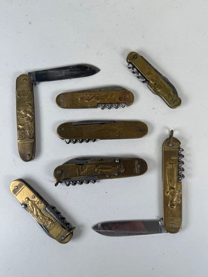 Set of 7 brass and steel pocket knives decorated...