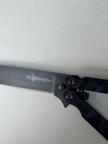 Set of three knives, one of which has an...