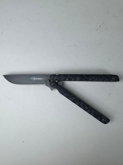 Set of three knives, one of which has an...