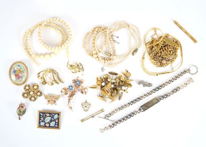 Costume jewelry set including: two silver...