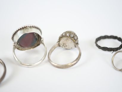 Set of three silver rings set with hard stones...