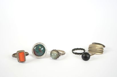 Set of three silver rings set with hard stones...
