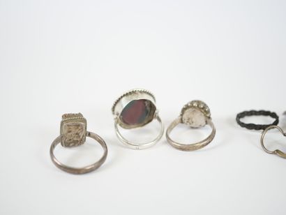 Set of three silver rings set with hard stones...
