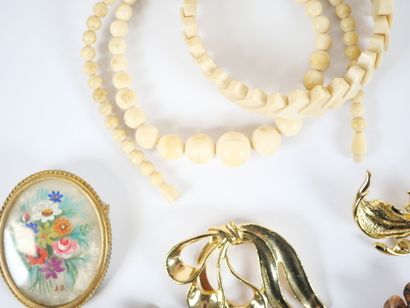 Costume jewelry set including: two silver...