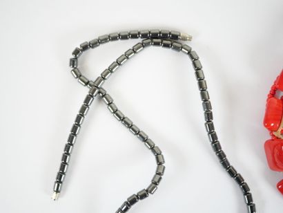 Set of four necklaces with pearls and costume...