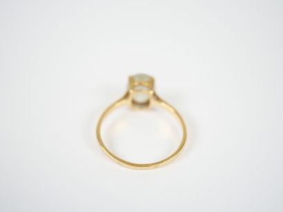 18K yellow gold ring set with a probable...