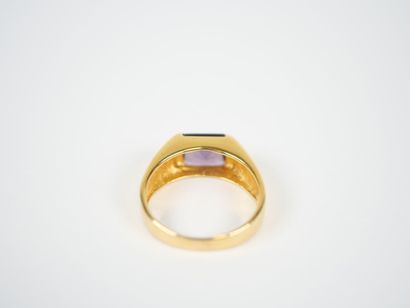 Large 18K yellow gold ring set with a square...