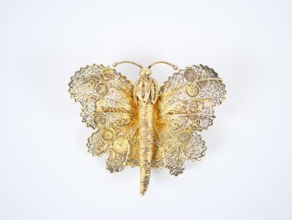 Two gilt silver filigree brooches featuring...
