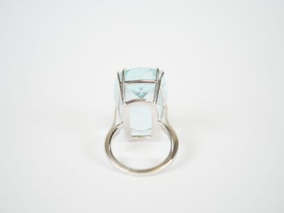 18K white gold ring set with a large faceted...