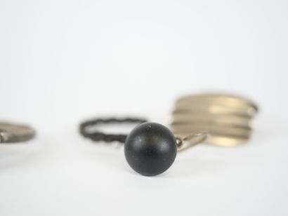 Set of three silver rings set with hard stones...