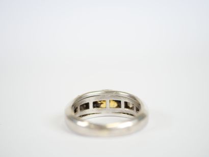 18K white gold ring centered on a probable...