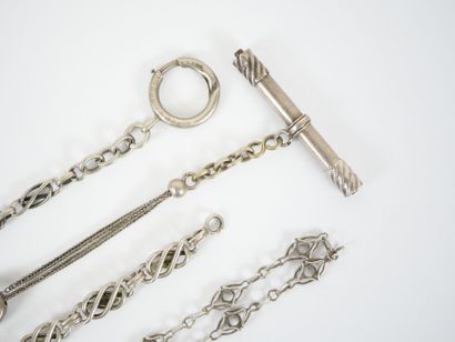 Set of three silver chatelaines.
A silver...