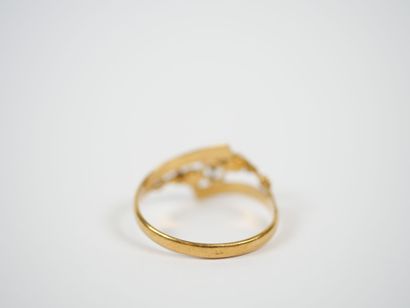 18K yellow gold ring decorated with stars...