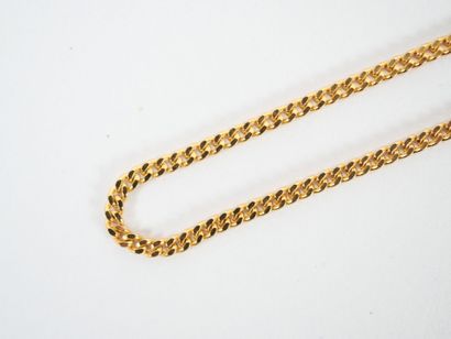 Gold-plated metal lot including : 
- a gilt-metal...