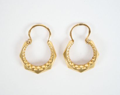 Pair of small faceted hoop earrings in 18K...