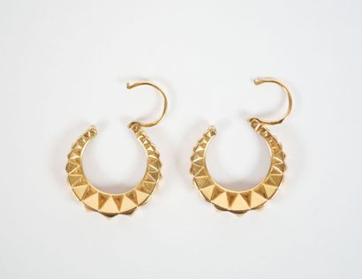 Pair of faceted hoop earrings in 18K yellow...