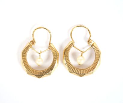 Pair of faceted hoop earrings in 18K yellow...