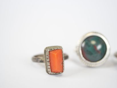 Set of three silver rings set with hard stones...