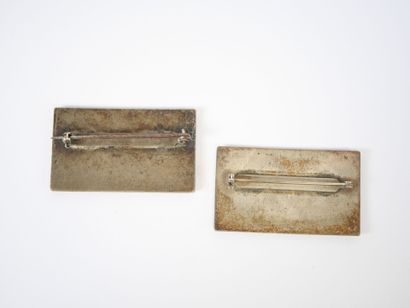 Two rectangular silver or metal and polychrome...
