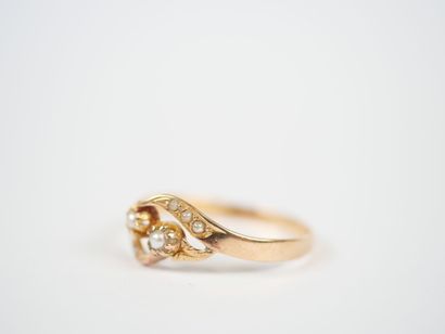 18K yellow gold ring decorated with stylized...