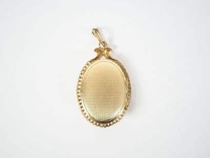 Oval gilded metal pendant-photo holder with...