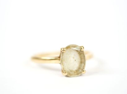 18K yellow gold ring set with a probable...